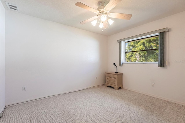 574 Macedonia Dr, Punta Gorda, FL 33950 - empty room featuring carpet and a ceiling fan