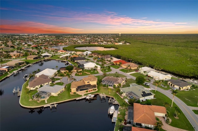 574 Macedonia Dr, Punta Gorda, FL 33950 - aerial view at dusk of a water view and a residential view