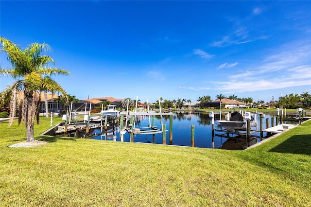 574 Macedonia Dr, Punta Gorda, FL 33950 - dock area with boat lift, a yard, and a water view
