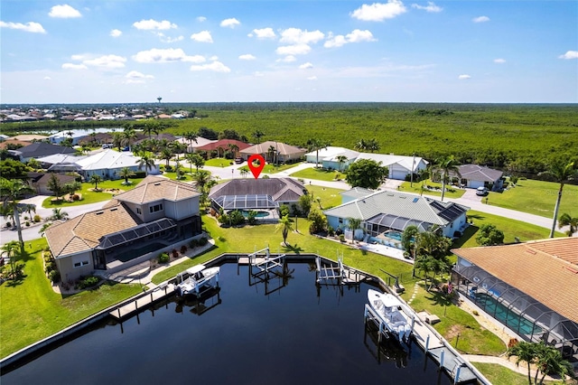 574 Macedonia Dr, Punta Gorda, FL 33950 - aerial perspective of suburban area with a forest and a large body of water