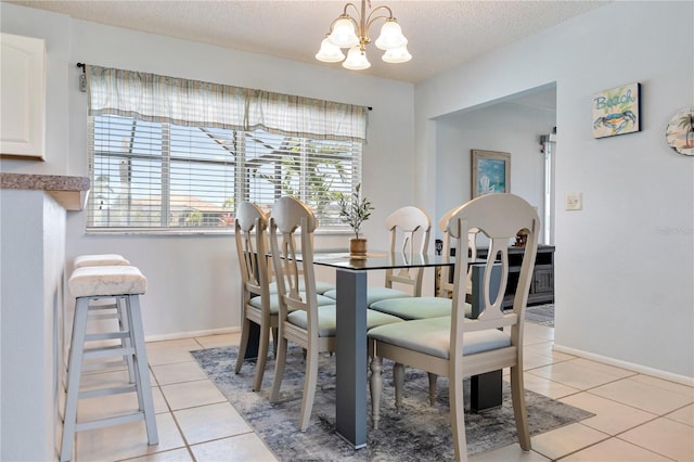 17103 Horizon Ln, Port Charlotte, FL 33948 - dining area featuring a chandelier, light tile patterned flooring, and a textured ceiling
