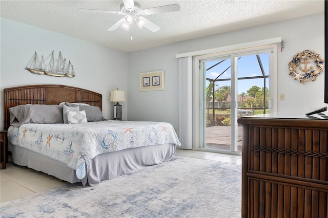 17103 Horizon Ln, Port Charlotte, FL 33948 - bedroom featuring light tile patterned floors, access to outside, a textured ceiling, and a ceiling fan