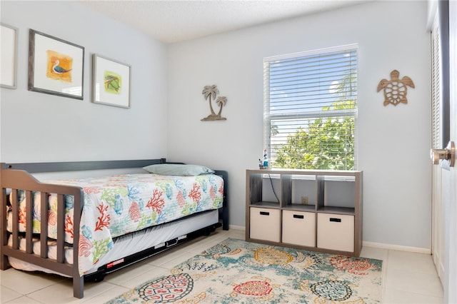17103 Horizon Ln, Port Charlotte, FL 33948 - bedroom with light tile patterned floors