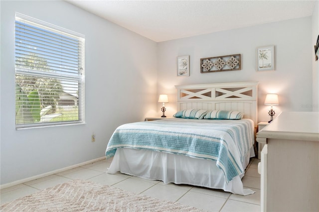 17103 Horizon Ln, Port Charlotte, FL 33948 - bedroom featuring tile patterned flooring and baseboards