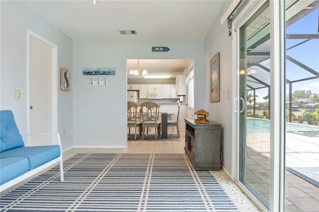 17103 Horizon Ln, Port Charlotte, FL 33948 - living area featuring baseboards and a chandelier