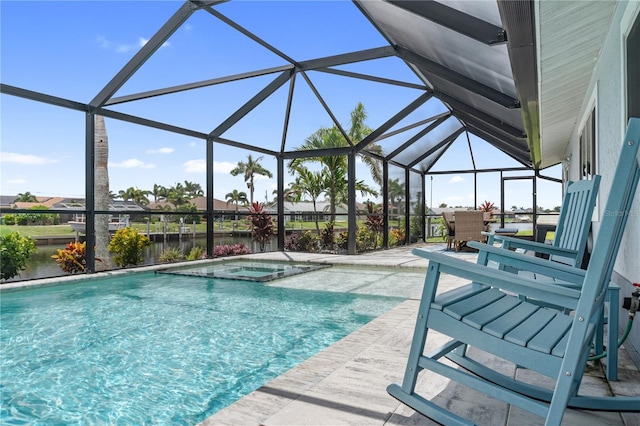 17103 Horizon Ln, Port Charlotte, FL 33948 - view of pool featuring a patio area, a pool with connected hot tub, and glass enclosure