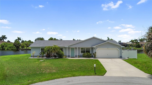17103 Horizon Ln, Port Charlotte, FL 33948 - single story home featuring a garage, a front lawn, driveway, and a water view