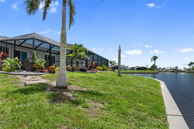 17103 Horizon Ln, Port Charlotte, FL 33948 - view of green lawn featuring a water view and glass enclosure