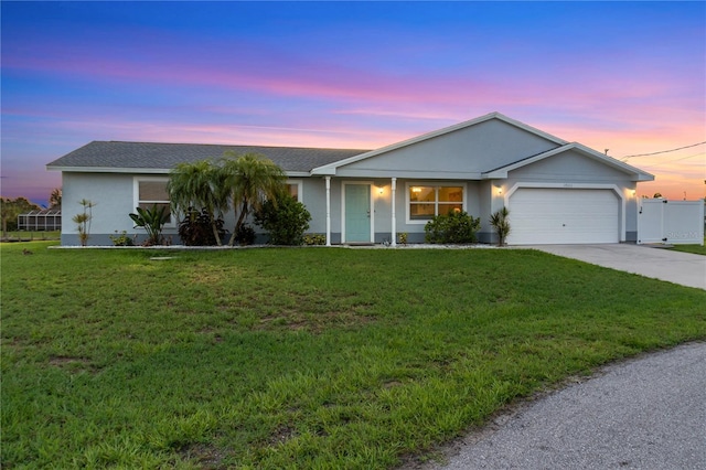 17103 Horizon Ln, Port Charlotte, FL 33948 - single story home with a garage, driveway, and stucco siding