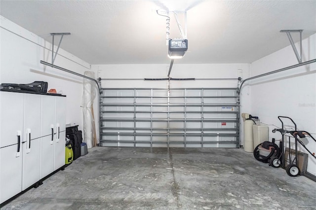 8516 Cache Dr, Sarasota, FL 34240 - garage with a garage door opener