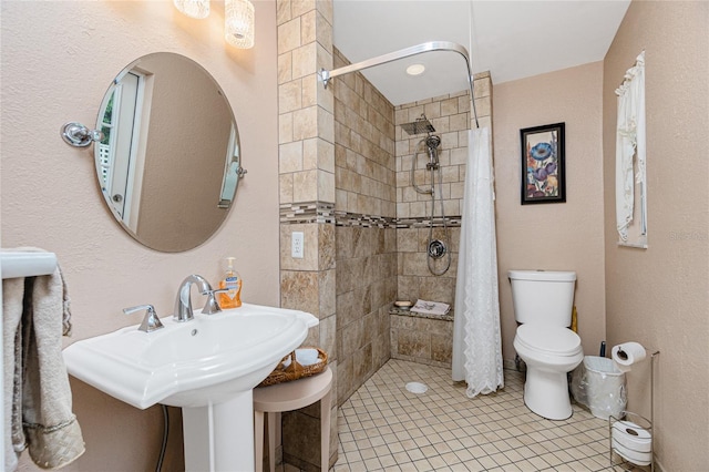 22559 Adorn Ave, Port Charlotte, FL 33952 - bathroom with a tile shower and tile patterned flooring