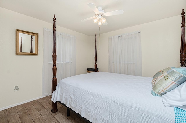 22559 Adorn Ave, Port Charlotte, FL 33952 - bedroom with wood finished floors and ceiling fan