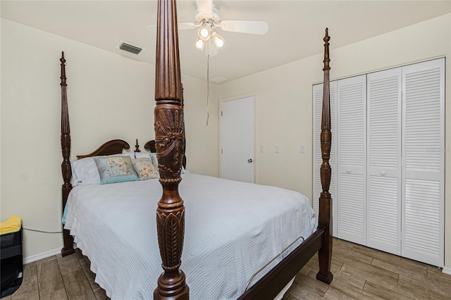 22559 Adorn Ave, Port Charlotte, FL 33952 - bedroom with wood finished floors, a closet, and ceiling fan