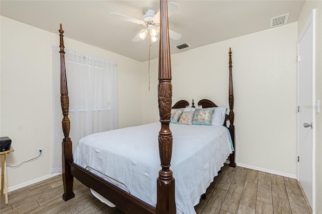 22559 Adorn Ave, Port Charlotte, FL 33952 - bedroom featuring wood finished floors and ceiling fan