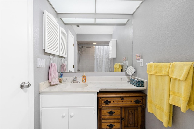 22559 Adorn Ave, Port Charlotte, FL 33952 - full bathroom featuring vanity, a textured wall, and a shower with curtain