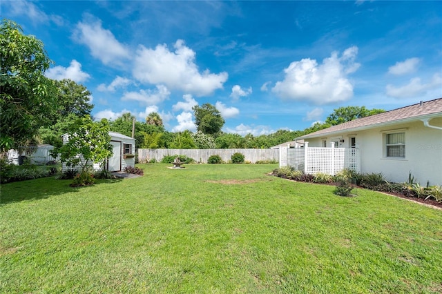 22559 Adorn Ave, Port Charlotte, FL 33952 - fenced backyard with a storage shed