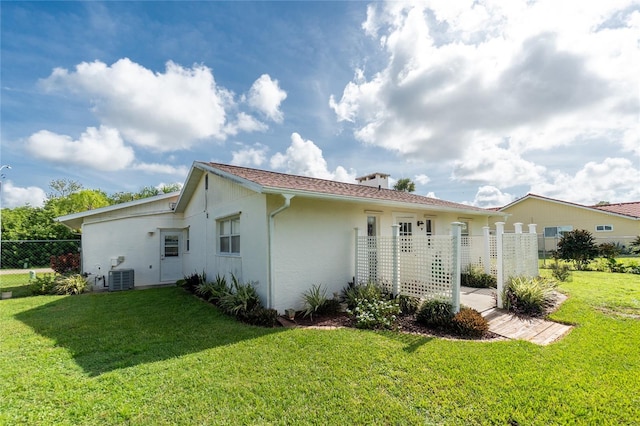 22559 Adorn Ave, Port Charlotte, FL 33952 - back of property featuring stucco siding