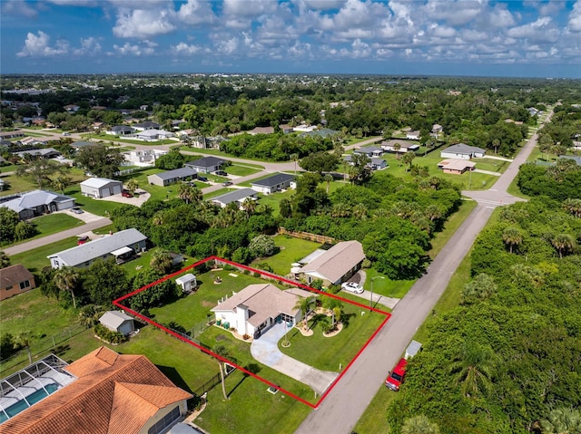 22559 Adorn Ave, Port Charlotte, FL 33952 - aerial perspective of suburban area featuring property parcel outlined