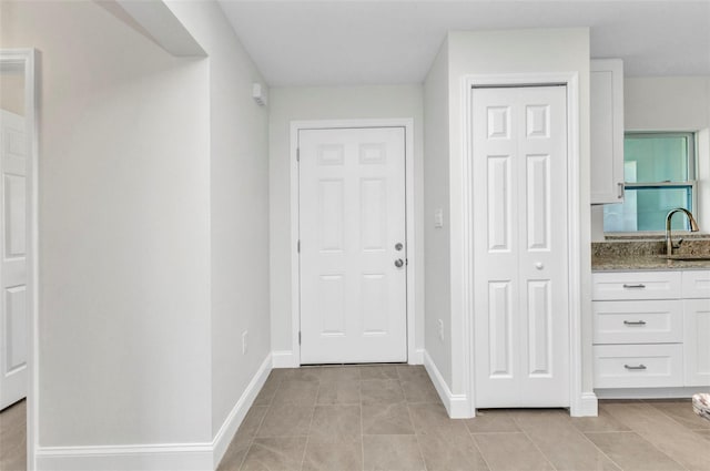 3435 W Price Blvd, North Port, FL 34286 - entrance foyer featuring light tile patterned flooring and baseboards