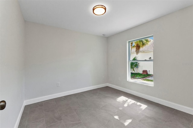 3435 W Price Blvd, North Port, FL 34286 - spare room with baseboards and tile patterned flooring