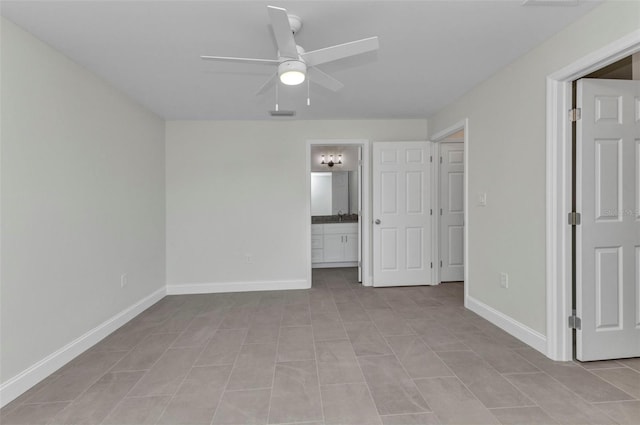 3435 W Price Blvd, North Port, FL 34286 - unfurnished bedroom with connected bathroom and ceiling fan