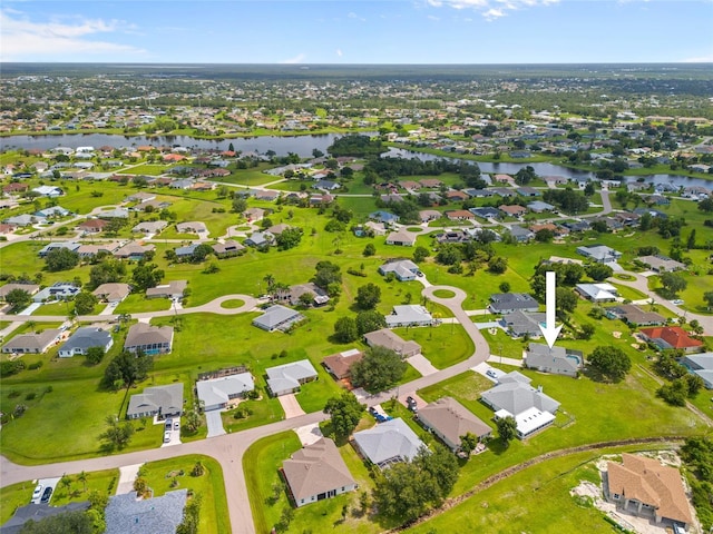 25451 Kowloon Ln, Punta Gorda, FL 33983 - aerial perspective of suburban area with a nearby body of water