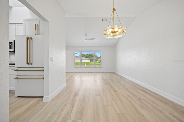 25451 Kowloon Ln, Punta Gorda, FL 33983 - unfurnished living room with light wood-type flooring, a ceiling fan, a chandelier, and a textured wall