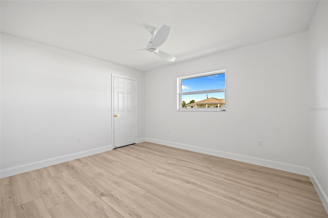 25451 Kowloon Ln, Punta Gorda, FL 33983 - empty room featuring a ceiling fan and light wood finished floors