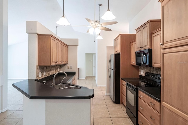 27102 Harbour Oaks Blvd, Punta Gorda, FL 33983 - kitchen featuring black appliances, dark countertops, light tile patterned flooring, ceiling fan, and tasteful backsplash