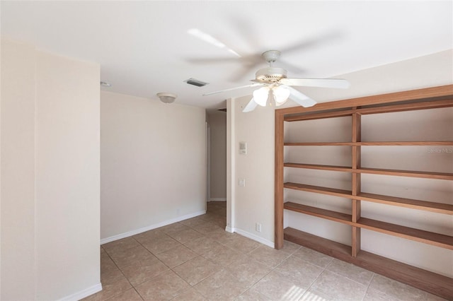 27102 Harbour Oaks Blvd, Punta Gorda, FL 33983 - empty room with light tile patterned floors and ceiling fan