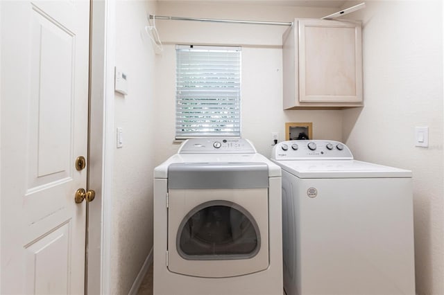 27102 Harbour Oaks Blvd, Punta Gorda, FL 33983 - washroom with washing machine and dryer and cabinet space