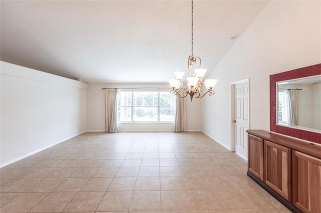 27102 Harbour Oaks Blvd, Punta Gorda, FL 33983 - empty room featuring light tile patterned flooring, a chandelier, and lofted ceiling