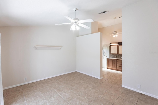27102 Harbour Oaks Blvd, Punta Gorda, FL 33983 - spare room featuring ceiling fan, light tile patterned floors, and high vaulted ceiling