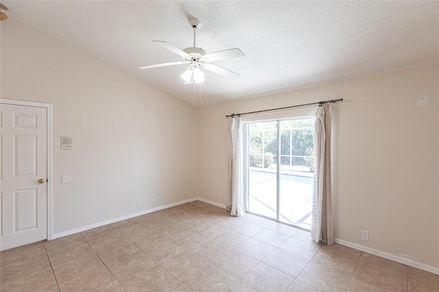 27102 Harbour Oaks Blvd, Punta Gorda, FL 33983 - spare room with ceiling fan, light tile patterned flooring, vaulted ceiling, and a textured ceiling