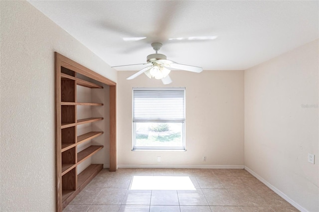 27102 Harbour Oaks Blvd, Punta Gorda, FL 33983 - empty room featuring a ceiling fan and light tile patterned flooring