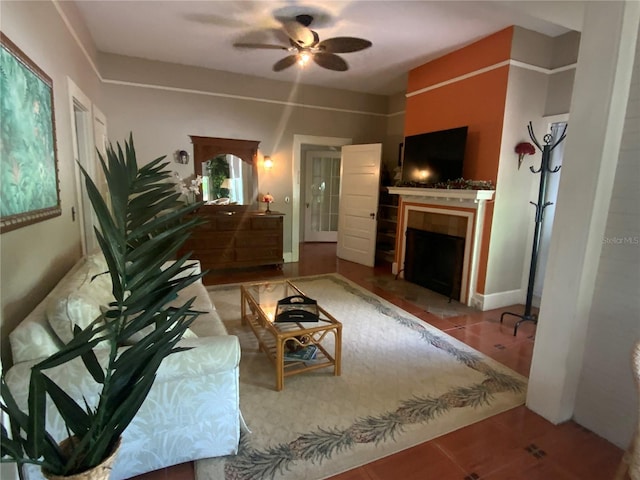 606 E Oak St, Arcadia, FL 34266 - living room with a ceiling fan and a tile fireplace