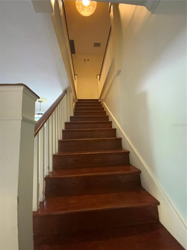 606 E Oak St, Arcadia, FL 34266 - stairs with wood finished floors