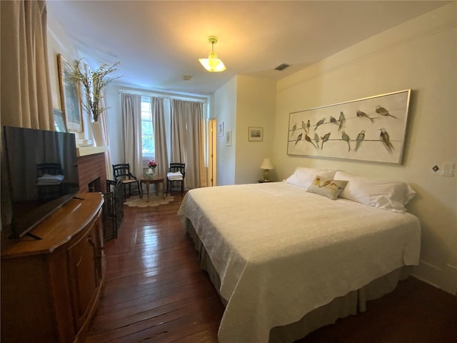 606 E Oak St, Arcadia, FL 34266 - bedroom with dark wood finished floors