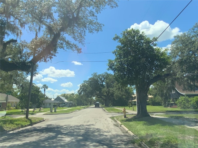 606 E Oak St, Arcadia, FL 34266 - view of asphalt road featuring curbs and sidewalks