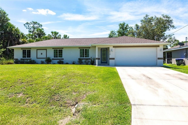 1710 Blackwood Cir, North Port, FL 34288 - ranch-style home with concrete driveway, an attached garage, stucco siding, and a front lawn