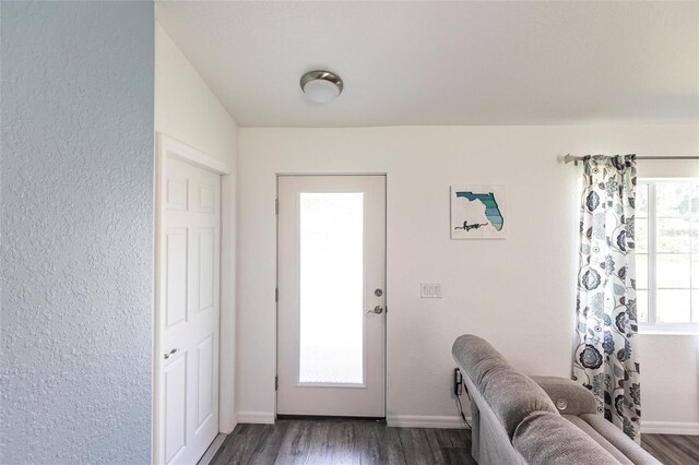 1710 Blackwood Cir, North Port, FL 34288 - entrance foyer featuring dark wood-style floors and a textured wall
