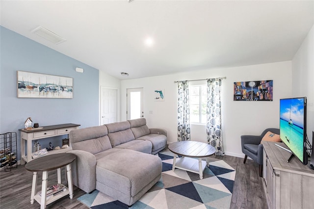 1710 Blackwood Cir, North Port, FL 34288 - living room featuring lofted ceiling and dark wood finished floors