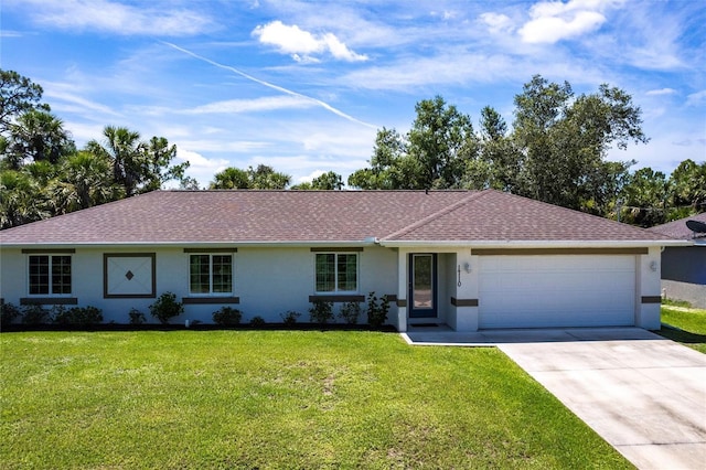 1710 Blackwood Cir, North Port, FL 34288 - ranch-style home with stucco siding, a garage, driveway, and a front yard