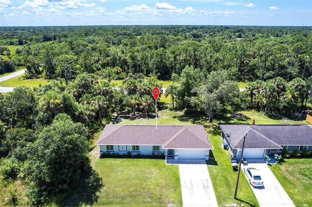 1710 Blackwood Cir, North Port, FL 34288 - view of subject property featuring a forest