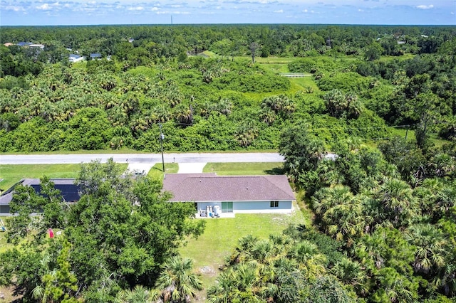 1710 Blackwood Cir, North Port, FL 34288 - view of subject property with a heavily wooded area