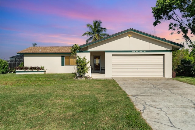 3425 Magnolia Way, Punta Gorda, FL 33950 - single story home featuring an attached garage, stucco siding, concrete driveway, and a yard