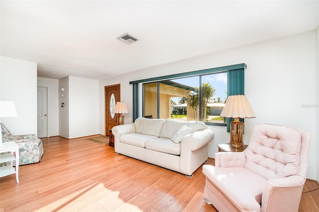 3425 Magnolia Way, Punta Gorda, FL 33950 - living room with light wood-type flooring