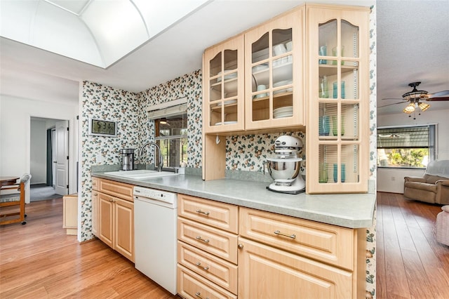 3425 Magnolia Way, Punta Gorda, FL 33950 - kitchen featuring dishwasher, wallpapered walls, light brown cabinets, light wood-style flooring, and a ceiling fan