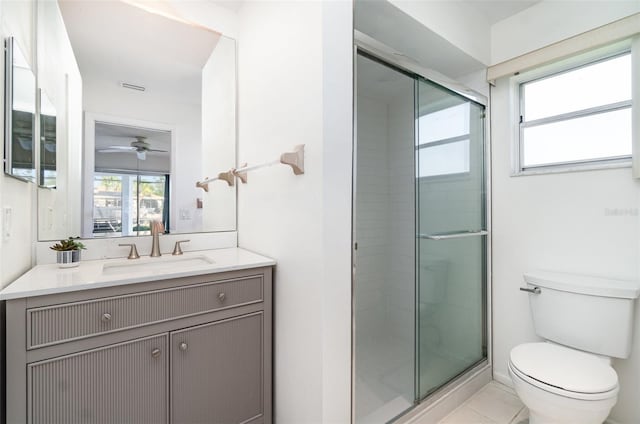 3425 Magnolia Way, Punta Gorda, FL 33950 - full bathroom featuring vanity, a ceiling fan, and a stall shower