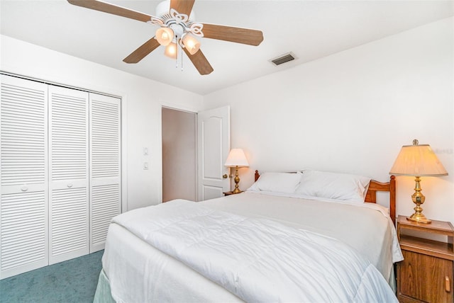 3425 Magnolia Way, Punta Gorda, FL 33950 - bedroom with carpet, a closet, and a ceiling fan